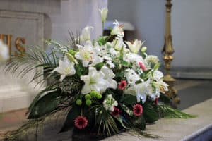 Bouquet of lily flowers on altar.